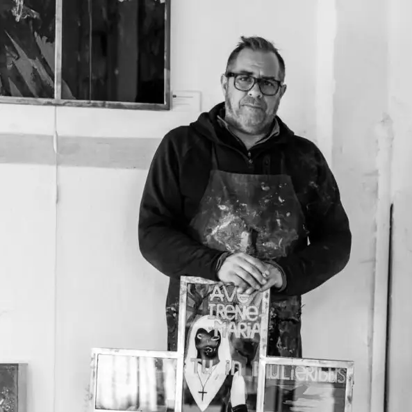 Olivier GODAT, a french artist, painter on Glass in his atelier.